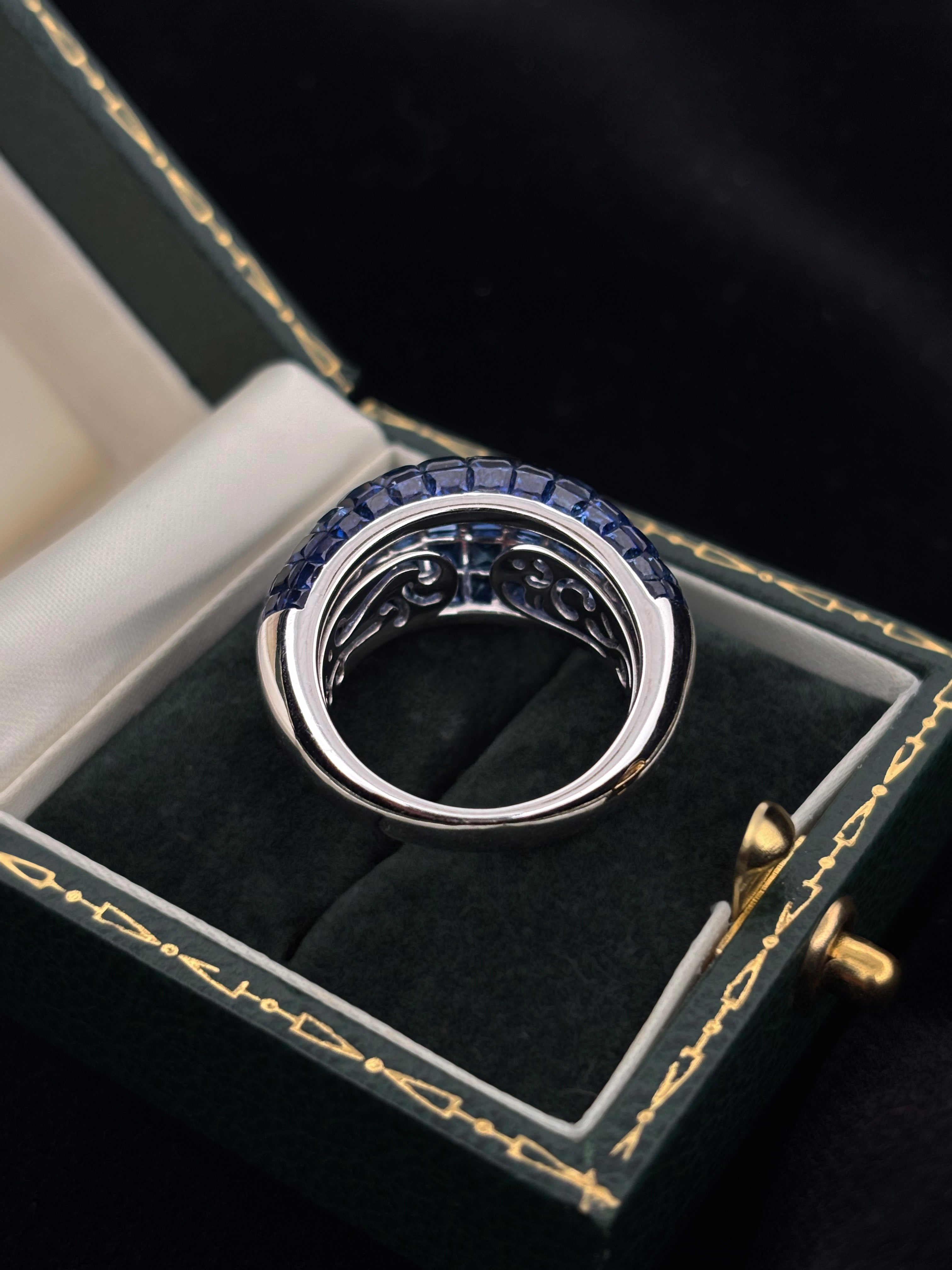 8.5ct of Sapphires Invisible Set White gold ring